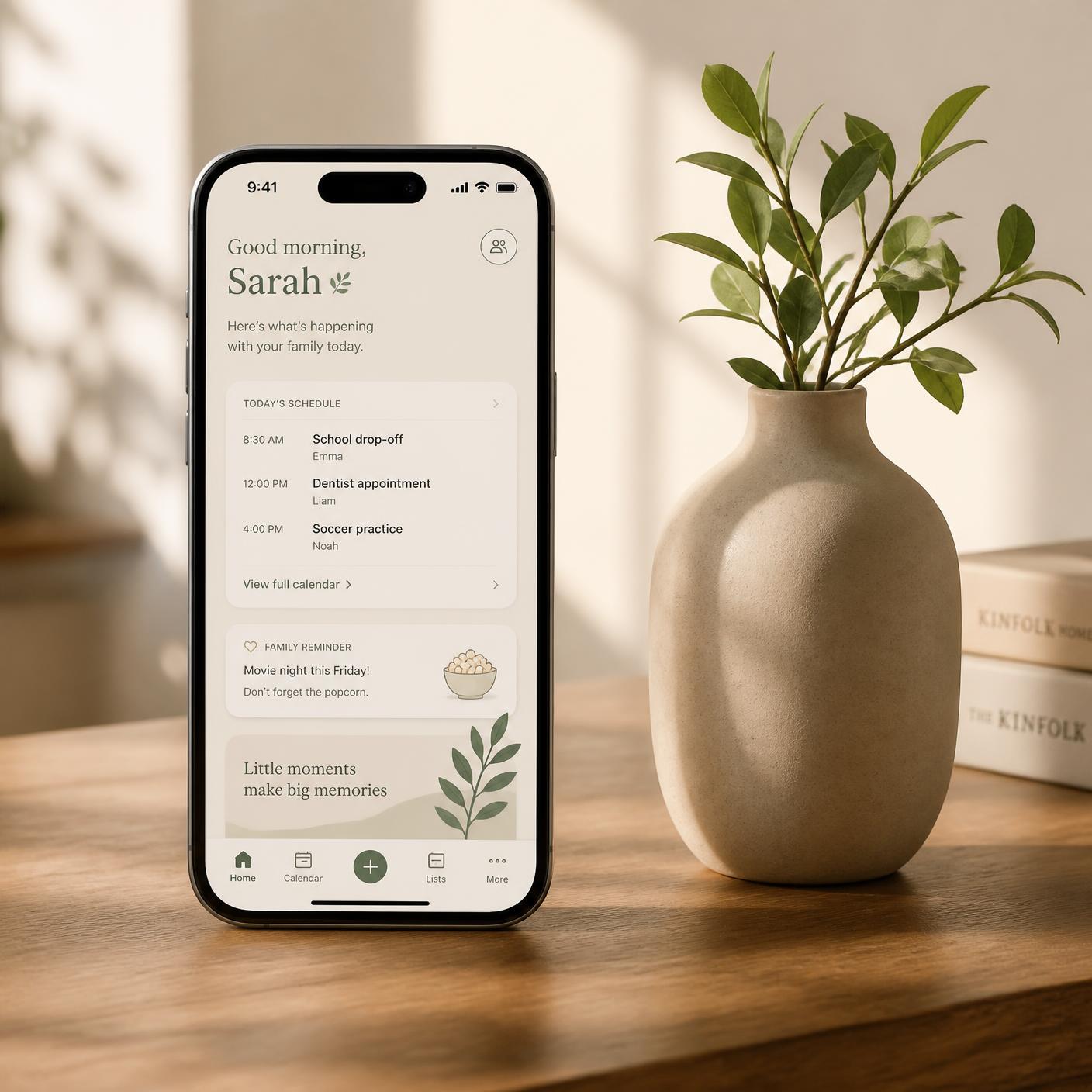 Elow app on a phone beside a ceramic vase